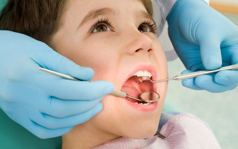Child Receiving Tooth Care