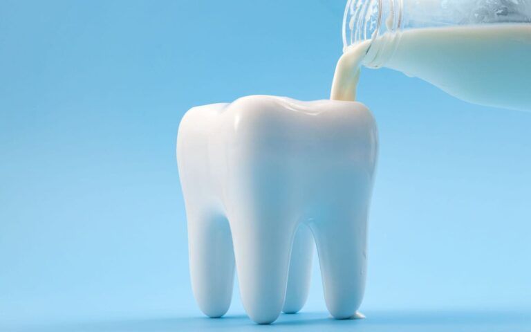 Vector Image of Tooth with Milk Pour from Glass
